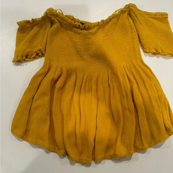 2/$20 Streetwear Society Mustard Ruffled smocked off the shoulder top - Picture 2 of 8